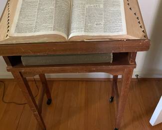 Dictionary stand on wheels.