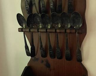 Spoon holder with bicentennial spoons.