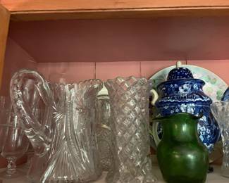 Antique pressed glass pitchers.