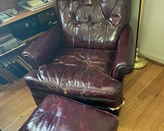 Leather armchair with ottoman.
