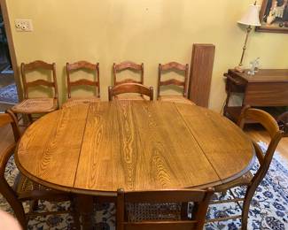 Drop leaf table and caned chairs 