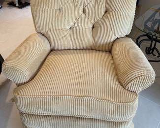 Recliner by Lane furniture.  Pale pastel yellow/cream color and really comfortable.