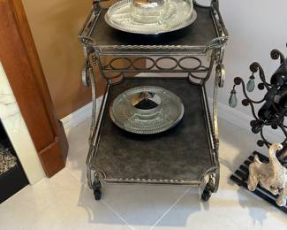 Tea Cart on wheels.  All metal with decorative details.