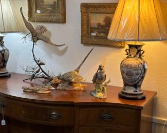 Boehm Hobby hawk with Pinecones, oil paintings and matching nautical lamps.