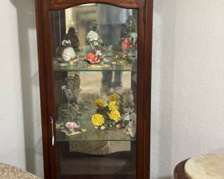 Beautiful lighted china cabinet and Boehm collectibles 