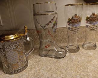 Vintage German beer stein, boot and glasses.