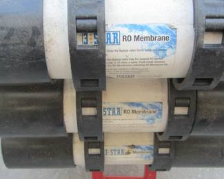 TAGS ON BOTTLES FROM WATER FILTERATION SYSTEM