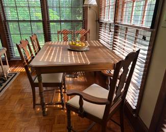 Antique dining table and chairs with turned legs 
