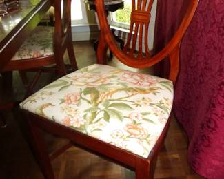 1 of 4 chairs that are included with dining table