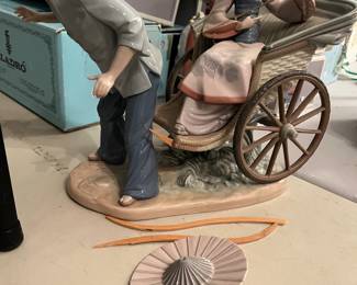 #152	Lladro Porcelain Figural Gorup "A Rickshaw Ride" Circa 1978 - as is no box and broken Reins and umbrella   Approx 13" x15.5"x8"	 $40.00 
