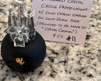 #11	Unsigned Crystal Castle Paperweight w/Gold Dragon Emblem on Solid Black Base (Believed to be made by "Crystal Caravan"	 $50.00 
#11	Unsigned Crystal Castle Paperweight w/Gold Dragon Emblem on Solid Black Base (Believed to be made by "Crystal Caravan"	 $50.00 
