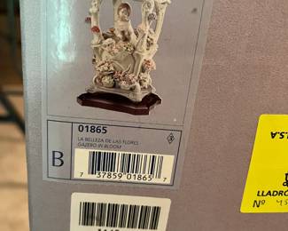 #100	Lladro 1865 Gazebo in Bloom Porcelain Sculpture 26.5x14 (boxed measurements)	 $1,500.00 
