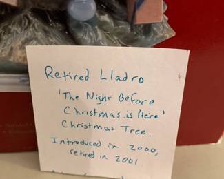 #99	Retired Lladro "Boy with Ornament - 9.5" Tall	 $55.00 
