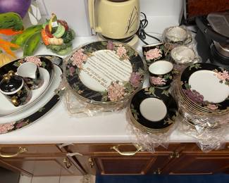 #318	Fitz and Floyd Cloisome Peony Black Dinnerware set 36 Pieces	 $250.00 
