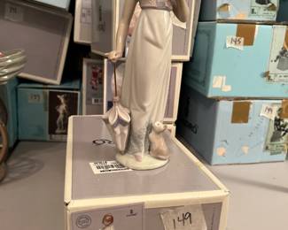#149	Lladro "Summer Stroll" 7611 Girl w/dove in her hand and Kitten by her side 	 $25.00 

