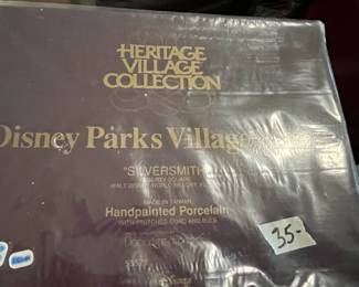 
#258	Heritage Village Disney Park Village Collection - Silversmith	 $35.00 
