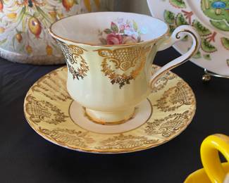 Paragon Yellow/Gold Floral and Fruit Teacup and Saucer