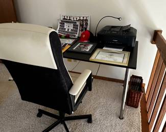 A nice office table and chair! Office supplies! 