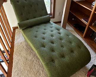 A beautiful moss green upholstered chaise lounge! 