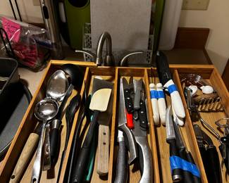 Lots of singles and sets of utensils and cutting boards! 