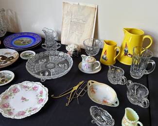 Two banquet table filled with antique and vintage pieces! 