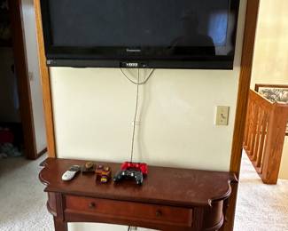Another flat screen and side table! 