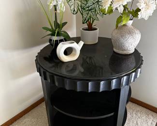 A very unique round scalloped edged table! 