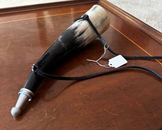 A beautiful Vintage Powder Horn with strap!