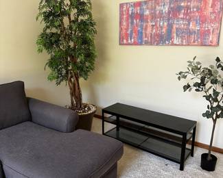 Another great piece of art! This sofa painting is signed by the artist too! 