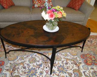 Slender pencil legs on this solid wood oval table