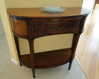 Small entrance table, 1/2 round.  Perfect for any room as a side table, or in a power room for extra style and storage