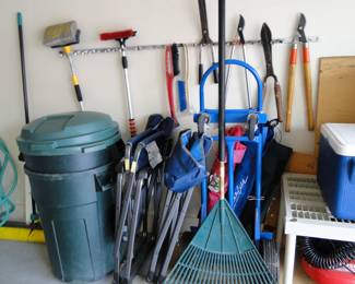 A pair of garbage cans.  A folding chairs.  An appliance dolly.  An assortment of branch trimmers............WHAT ARE THINGS YOU FIND IN A GARAGE AT A GREAT LAKES ESTATE SALE..........YOU WIN THE $100,000 PYRAMID!!