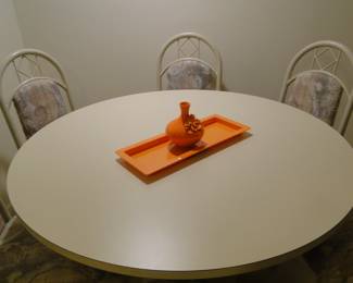 Large top, perfect for snacks, cards and beverages.  Also, an excellent table for the holidays, for extra seats, and serving