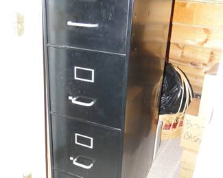 Tall, black four drawer file cabinet