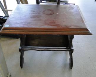 Side table that holds books too, so one might be able to correctly call this  "Table Bookshelf".