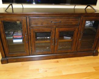 Solid wood, entertainment center, plenty of storage