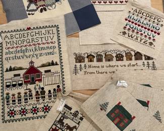 Dozens of expertly made need-point pieces; some are sets.  Ready for framing.