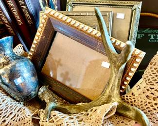 Mix doilies with hides, frames, silver, and brass.