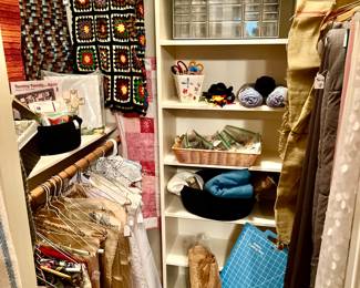 Closet full of sewing and vintage linens. 