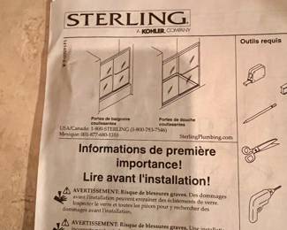 NEW - Sterling sliding glass shower door 