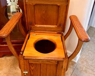 Vtg. Oak chamber pot chair