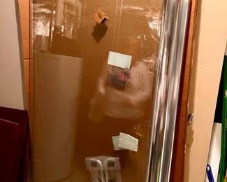 NEW - Sterling sliding glass shower door 