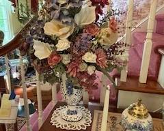 floral arrangement, candle sticks, ceramic decor