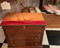 Chest with ocean sailing scene