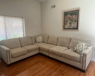 Light gray L-shaped sectional sofa