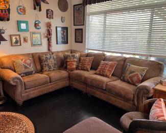 Leather sectional with nail head trim 