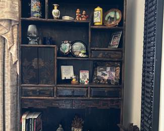 Beautiful Chinese curio shelf, this is a beautifully detailed pice, don’t miss it, you will find this piece in the sitting room off of the master bedroom. 