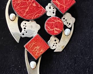 Large modernist style pendant ; the red elements are most likely sponge coral. 