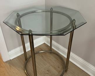 SEVERAL SIDE TABLES WITH GLASS TOPS
