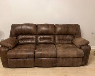 AVAILABLE FOR PRESALE- Sofa that reclines on both sides.